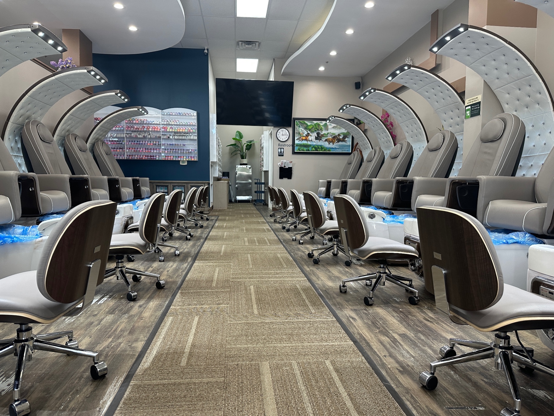 Sue's Nails & Spa storefront at Woodpointe Plaza, Grand Rapids