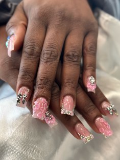 Pink coffin nails with rhinestones and 3D bling