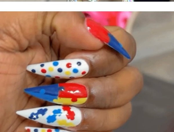 Bold red, blue, yellow pop-art stiletto nails