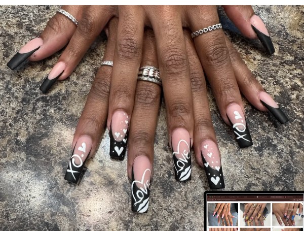 Black coffin nails with white XO and Love hearts